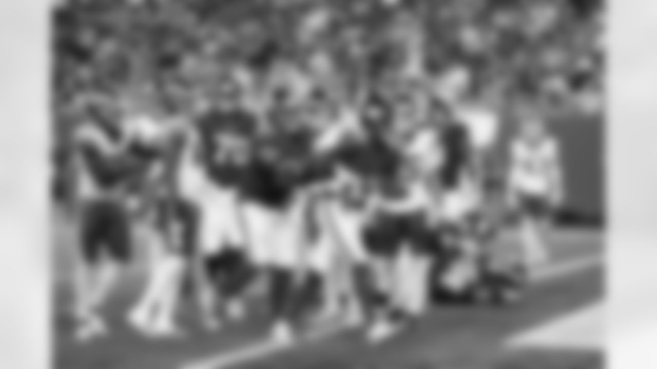 New York Giants quarterback Jameis Winston (19),New York Giants guard Aaron Stinnie (64)