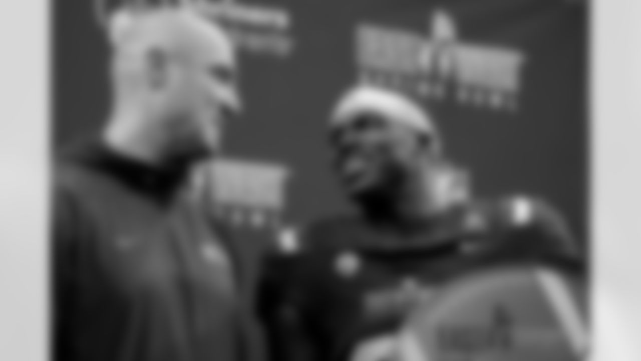 West head coach Mike Kafka, left, of the New York Giants, stands on stage with defensive MVP Jarius Monroe, of Tulane, following the East West Shrine Bowl NCAA college football game in Frisco, Texas, Thursday, Feb. 1, 2024. (AP Photo/Julio Cortez)