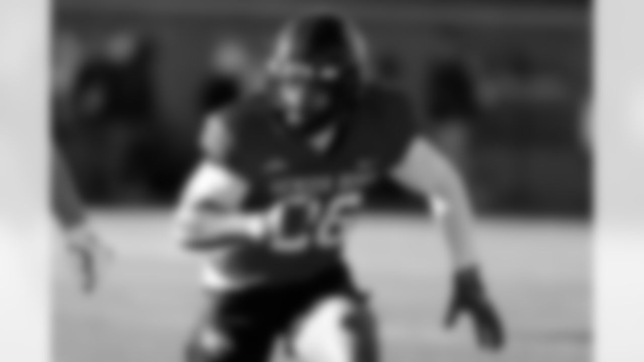 National Team safety Wydett Williams (26), of Mississippi, runs through drills during practice for the Senior Bowl NCAA college football game Tuesday, Jan. 27, 2026, in Mobile, Ala. (AP Photo/Butch Dill)