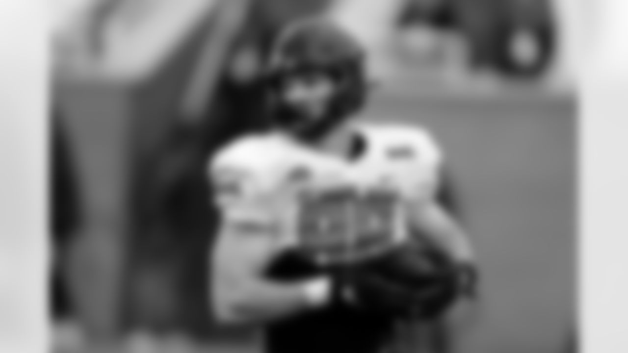 American Team tight end Daniel Bellinger of San Diego State runs through drills during practice for the Senior Bowl NCAA college football game Wednesday, Feb. 2, 2022, in Mobile, Ala. (AP Photo/Butch Dill)