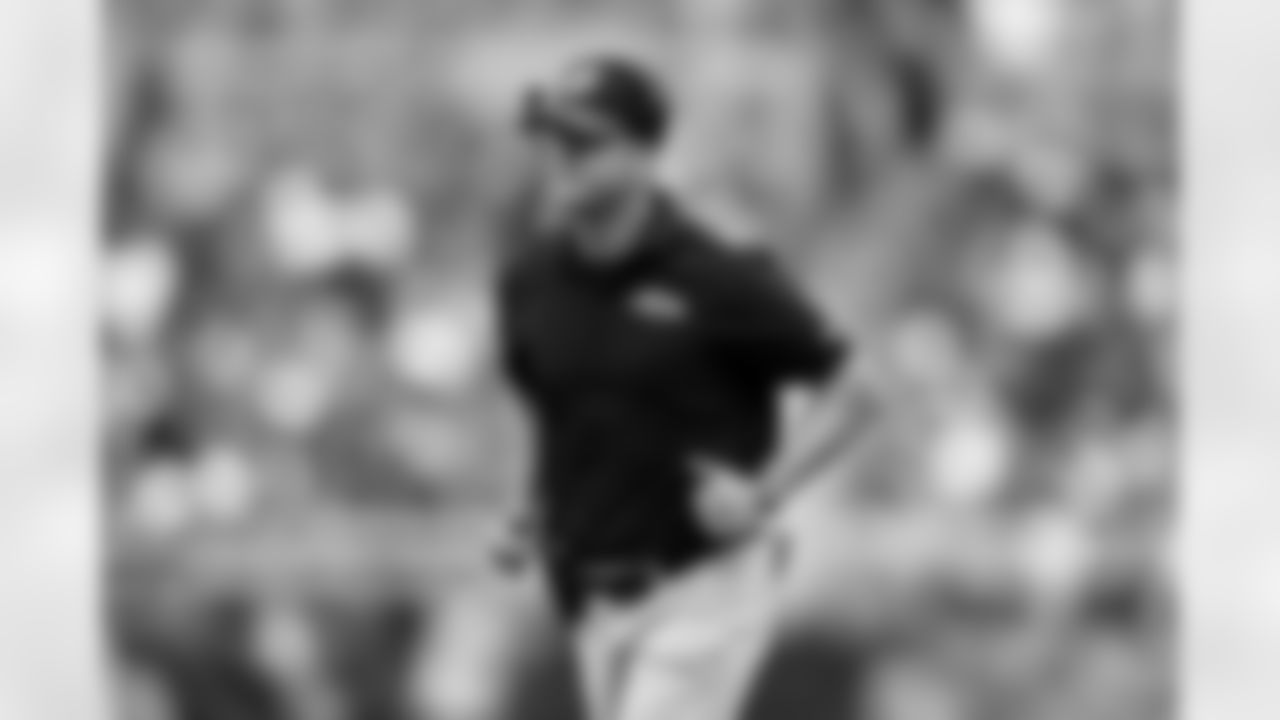 Baltimore Ravens head coach John Harbaugh runs on the field to check on an injured player during the second half of an NFL football game against the Houston Texans, Sunday, Sept. 10, 2023, in Baltimore. (AP Photo/Nick Wass)