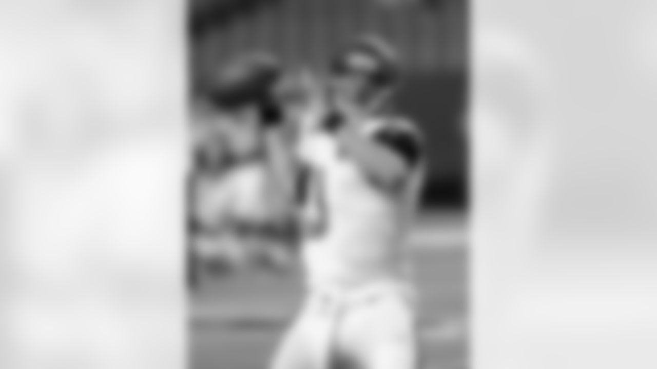 Jacksonville Jaguars Mike Kafka works before the first half of a preseason NFL football game against the Atlanta Falcons, Thursday, Aug. 29, 2013, in Atlanta. (AP Photo/Dave Martin)