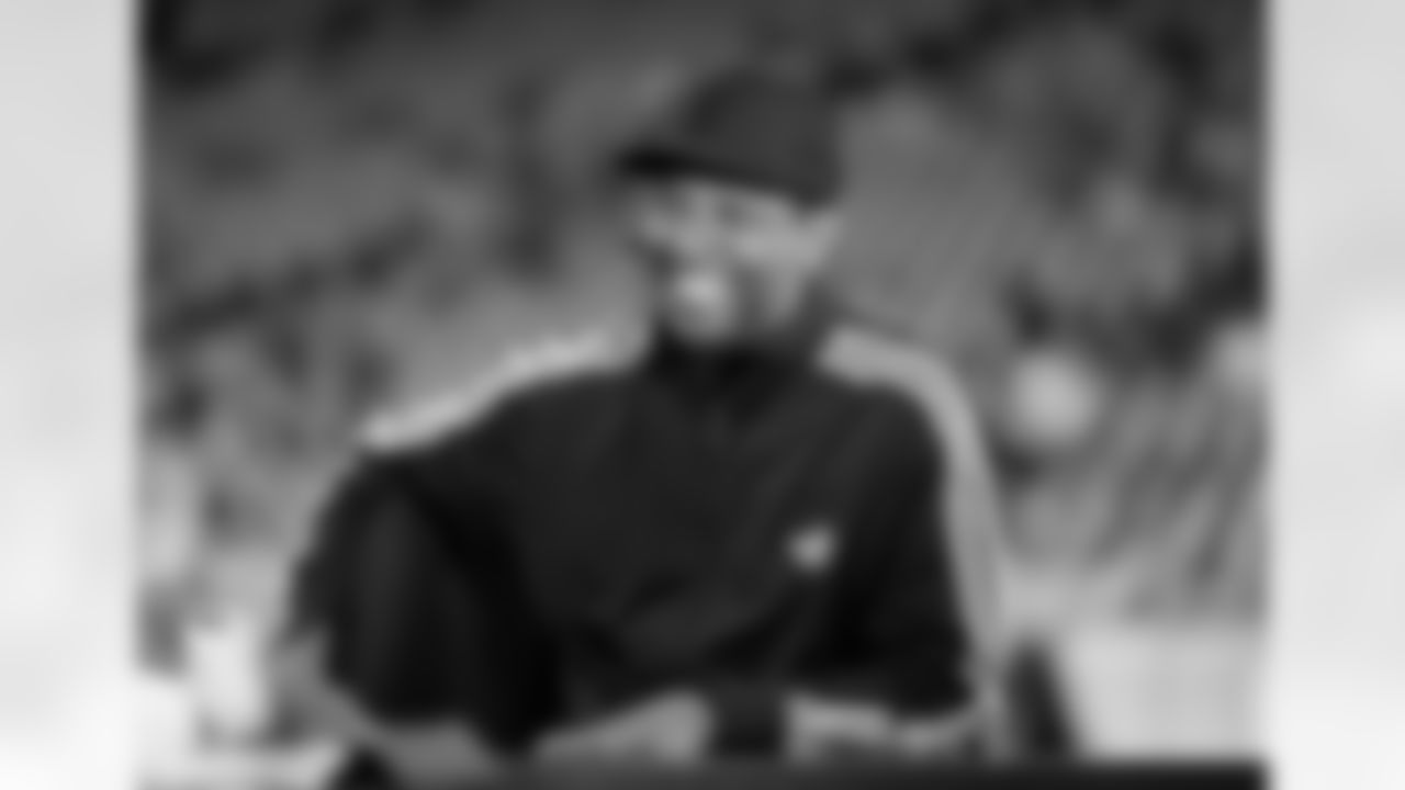 Actor Denzel Washington is shown during the ESPN Countdown show on the sidelines before a NFL football game between the New York Giants and Detroit Lions in Detroit, Monday, Sept. 8, 2014. (AP Photo/Paul Sancya)