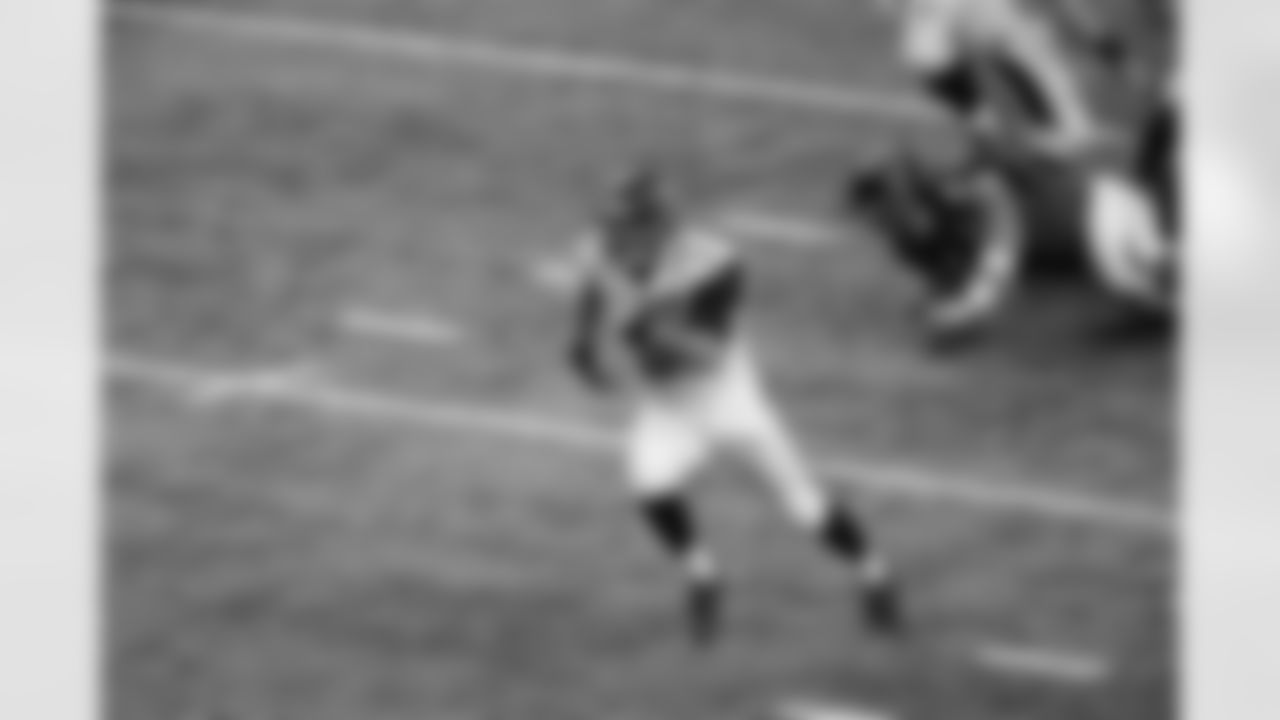 Jacksonville Jaguars quarterback Mike Kafka (3) works against the Atlanta Falcons during the second half of a preseason NFL football game, Thursday, Aug. 29, 2013, in Atlanta. (AP Photo/John Bazemore)