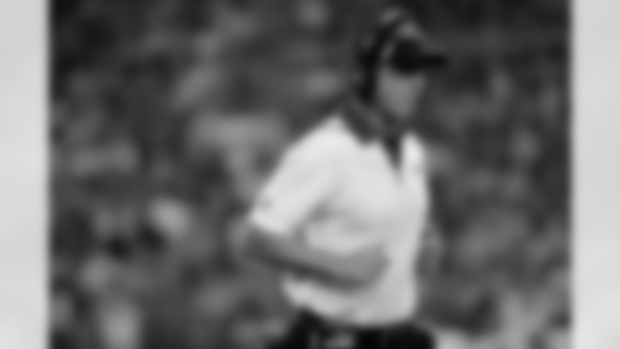 Baltimore Ravens head coach John Harbaugh jogs off the field during the first half of a preseason NFL football game against the Philadelphia Eagles, Saturday, Aug. 22, 2015, in Philadelphia. (AP Photo/Matt Rourke)