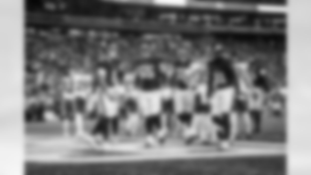 QB Jaxson Dart (6), G Austin Schlottmann (65)