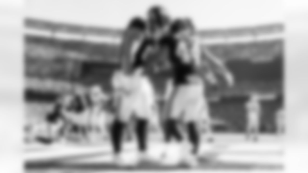 RB Cam Skattebo (44), C John Michael Schmitz Jr. (61), TE Theo Johnson (84)