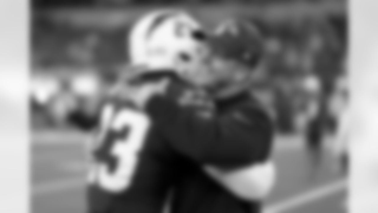 Los Angeles Chargers safety Tony Jefferson (23) and Baltimore Ravens head coach John Harbaugh interact prior to an NFL football game on Monday, November 25, 2024 in Inglewood, Calif. The Ravens defeated the Chargers, 30-23. (Ben Liebenberg via AP)