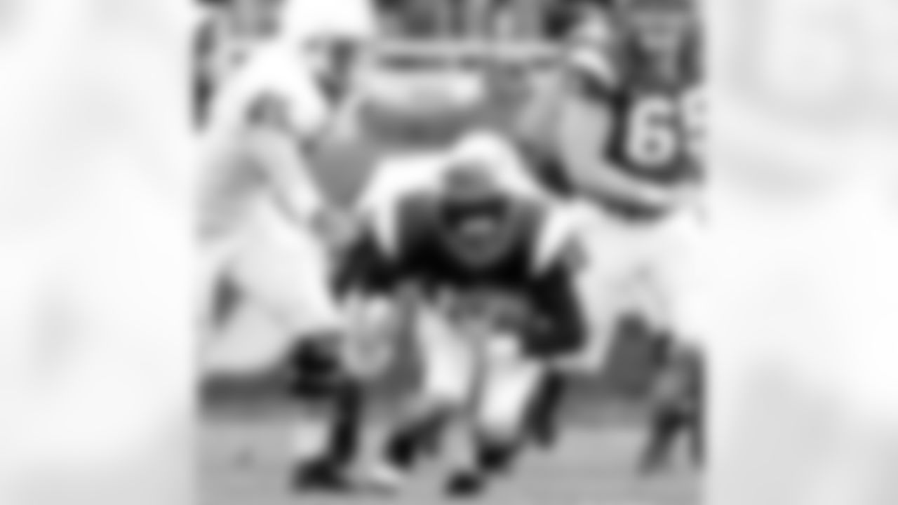 Northwestern quarterback Mike Kafka runs with the ball during the second quarter of an NCAA college football game against Penn State's Sean Lee (45) in Evanston, Ill., Saturday, Oct. 31, 2009. (AP Photo/Nam Y. Huh)