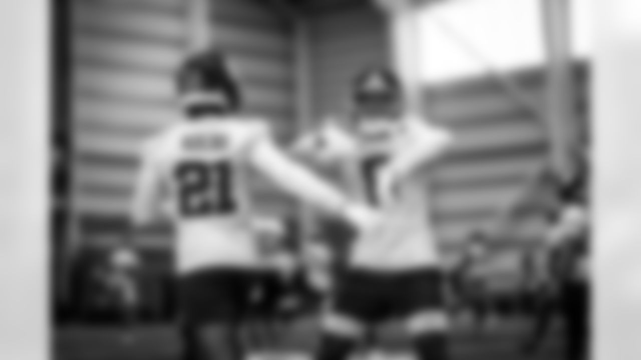 S Jevón Holland (8) and CB Paulson Adebo (21)