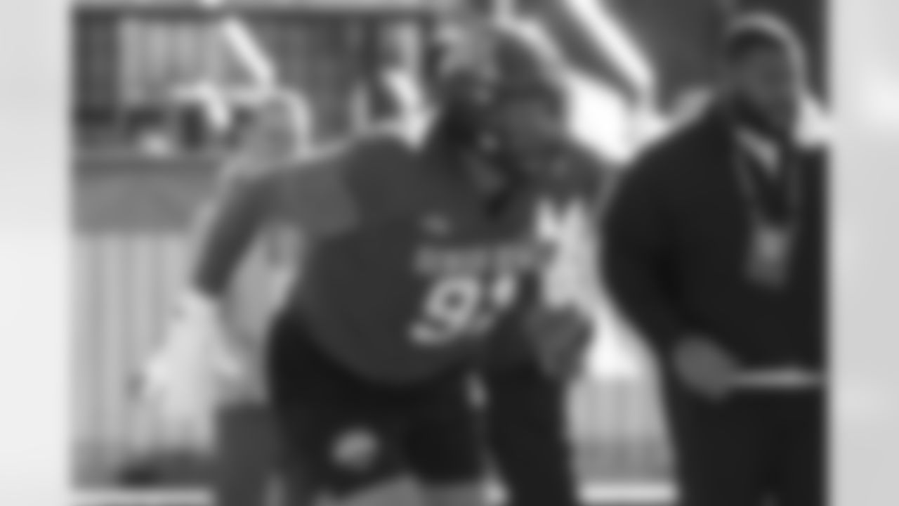 National Team defensive tackle Deven Eastern (91), of Minnesota, runs through drills during practice for the Senior Bowl NCAA college football game Tuesday, Jan. 27, 2026, in Mobile, Ala. (AP Photo/Butch Dill)