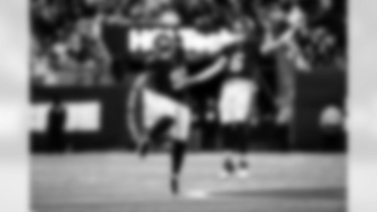 DT Darius Alexander (91), QB Jaxson Dart (6)