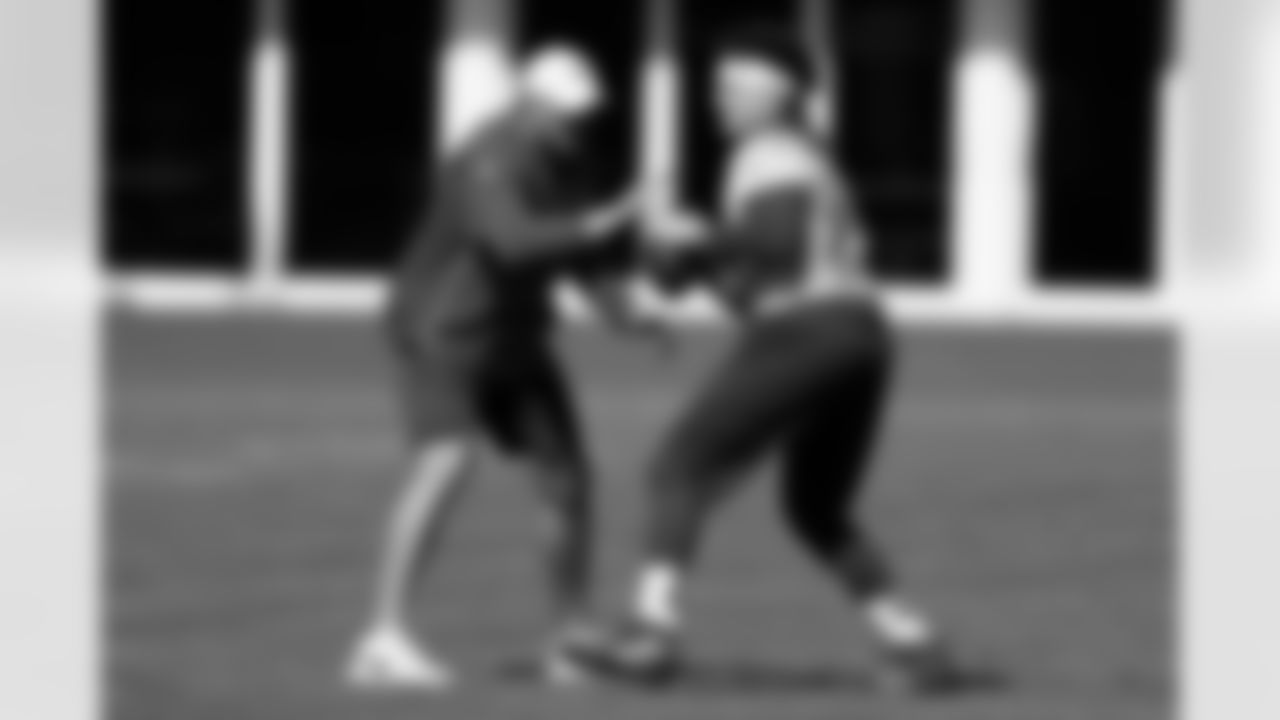 Kansas City Chiefs quarterback Patrick Mahomes (15) runs drills with coach Mike Kafka during practice on Wednesday, Jan. 29, 2020, in Davie, Fla., for the NFL Super Bowl 54 football game. (AP Photo/Brynn Anderson)