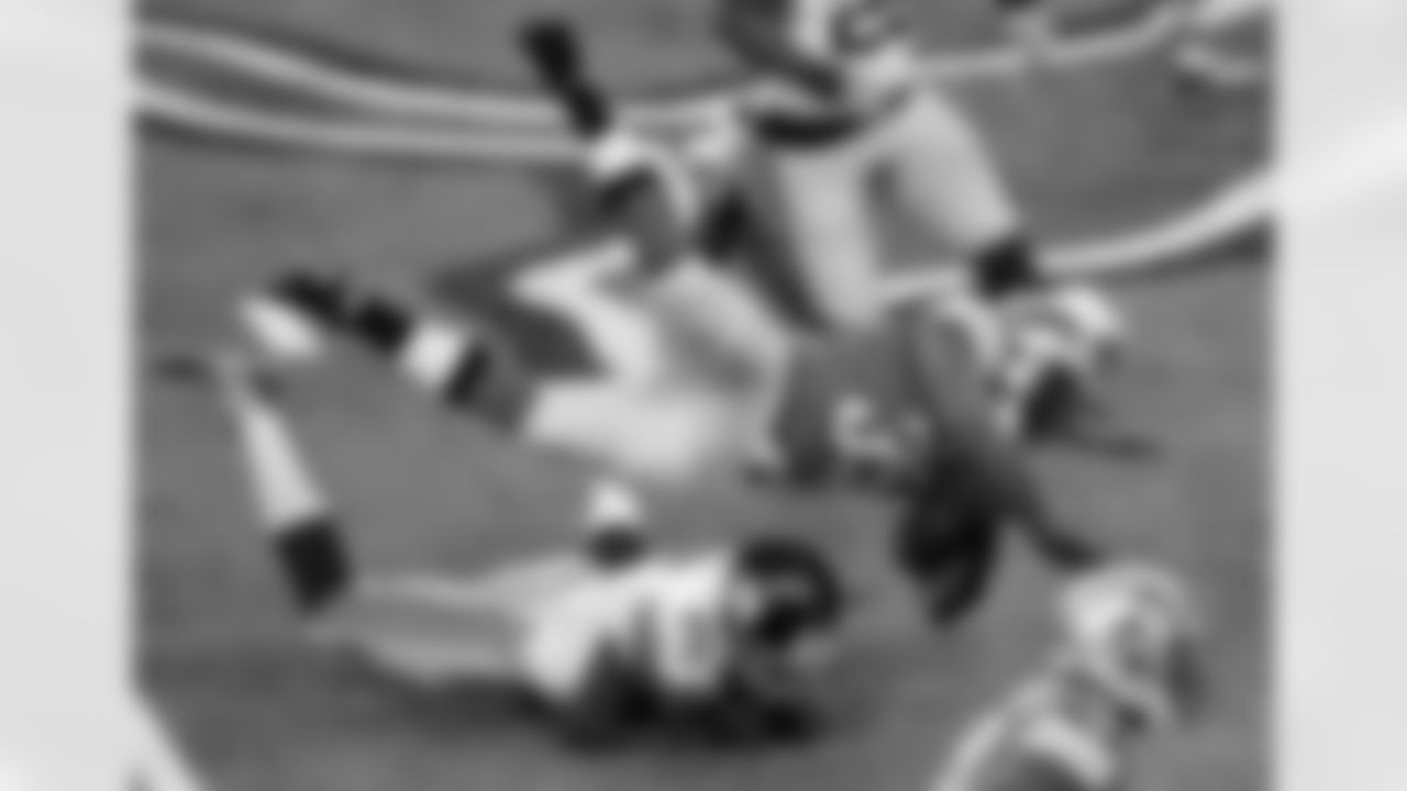 Detroit Lions running back Joique Bell (35) is upended by New York Giants free safety Will Hill (25) during the first quarter of an NFL football game, Sunday, Dec. 22, 2013, in Detroit. (AP Photo/Paul Sancya)