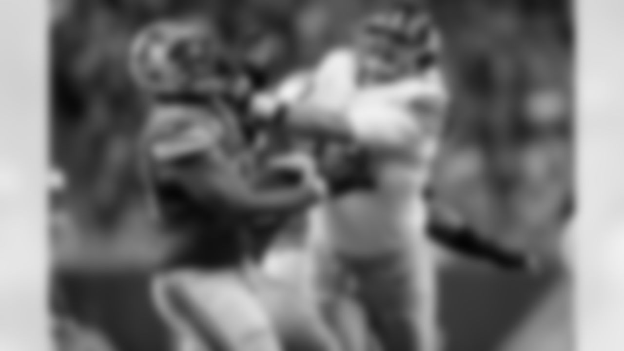 Detroit Lions defensive tackle Ndamukong Suh (90) goes up against New York Giants offensive tackle Justin Pugh (72) during the second quarter of an NFL football game in Detroit, Sunday, Dec. 22, 2013. (AP Photo/Paul Sancya)