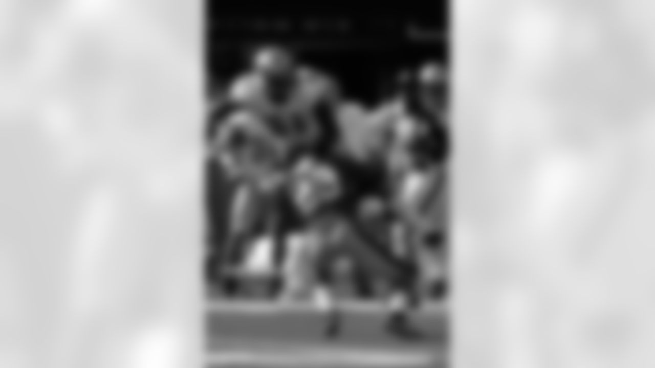 Detroit Lions wide receiver Calvin Johnson (81) is tackled by New York Giants cornerback Corey Webster (23) during the second quarter of an NFL football game between the Detroit Lions and the New York Giants at New Meadowlands Stadium Sunday, Oct. 17, 2010, in East Rutherford, N.J. (AP Photo/Seth Wenig)