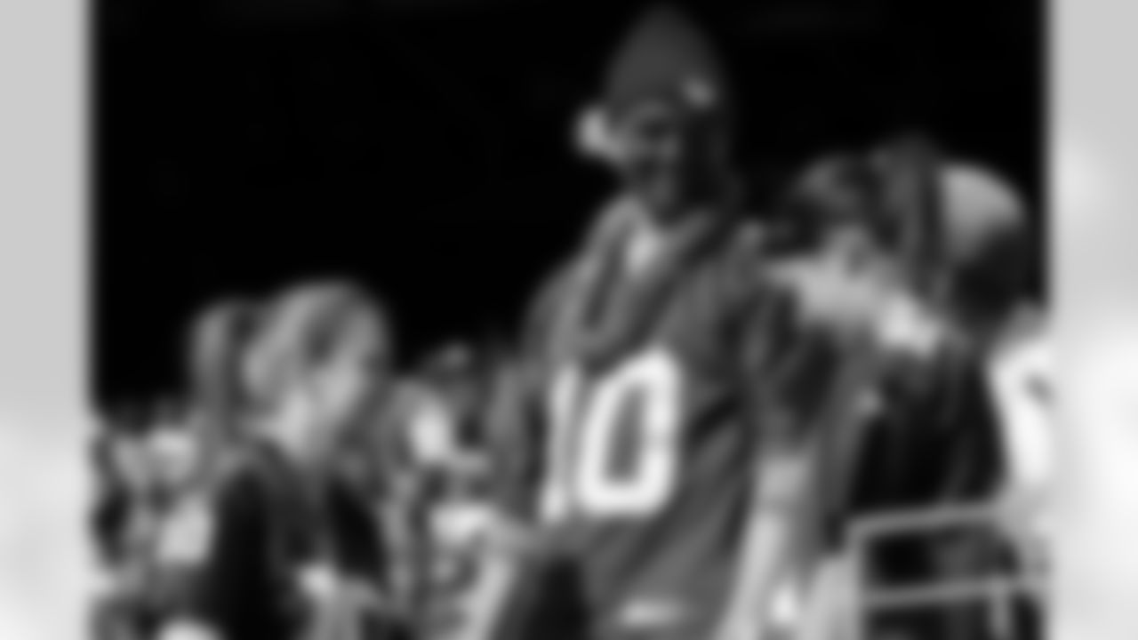 New York Giants fans look on during the second quarter of an NFL football game between the Detroit Lions and the New York Giants at New Meadowlands Stadium Sunday, Oct. 17, 2010, in East Rutherford, N.J. (AP Photo/Seth Wenig)