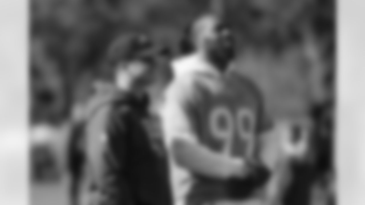 AFC head coach John Harbaugh, left, of the Baltimore Ravens, talks with Ravens linebacker Matthew Judon during a practice for NFL Pro Bowl football game Wednesday, Jan. 22, 2020, in Kissimmee, Fla. (AP Photo/John Raoux)