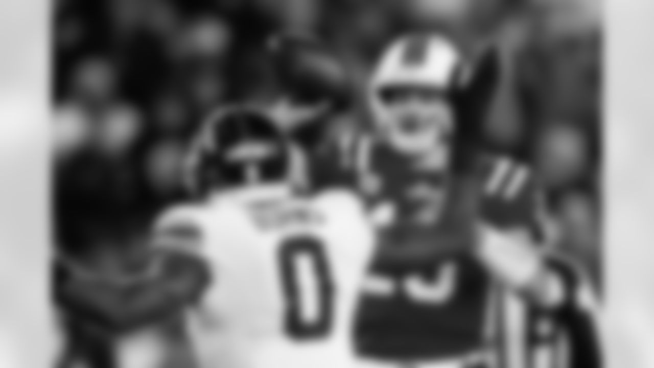 New England Patriots quarterback Drake Maye (10) makes a pass while under pressure by New York Giants linebacker Brian Burns (0) during the second half of an NFL football game, Monday, Dec. 1, 2025, in Foxborough, Mass. (AP Photo/Greg M. Cooper)