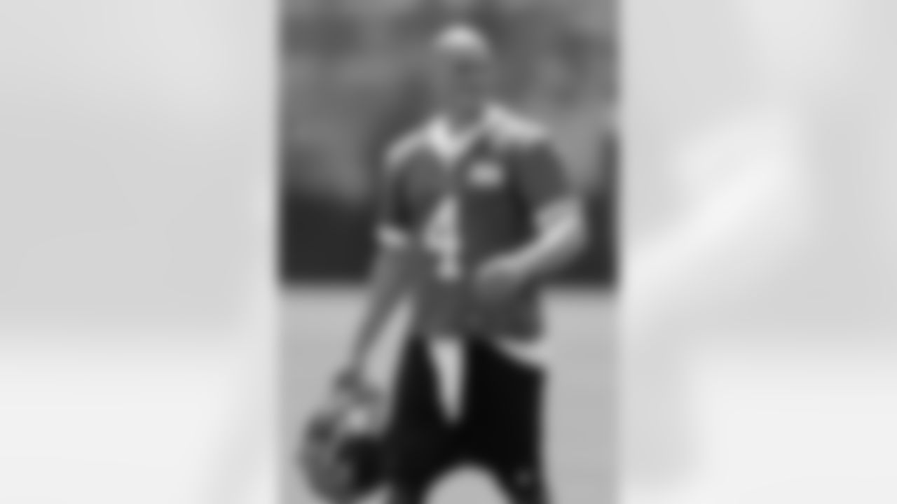 Jacksonville Jaguars quarterback Mike Kafka leaves the field after NFL football minicamp, Wednesday, June 12, 2013, in Jacksonville, Fla. (AP Photo/John Raoux)