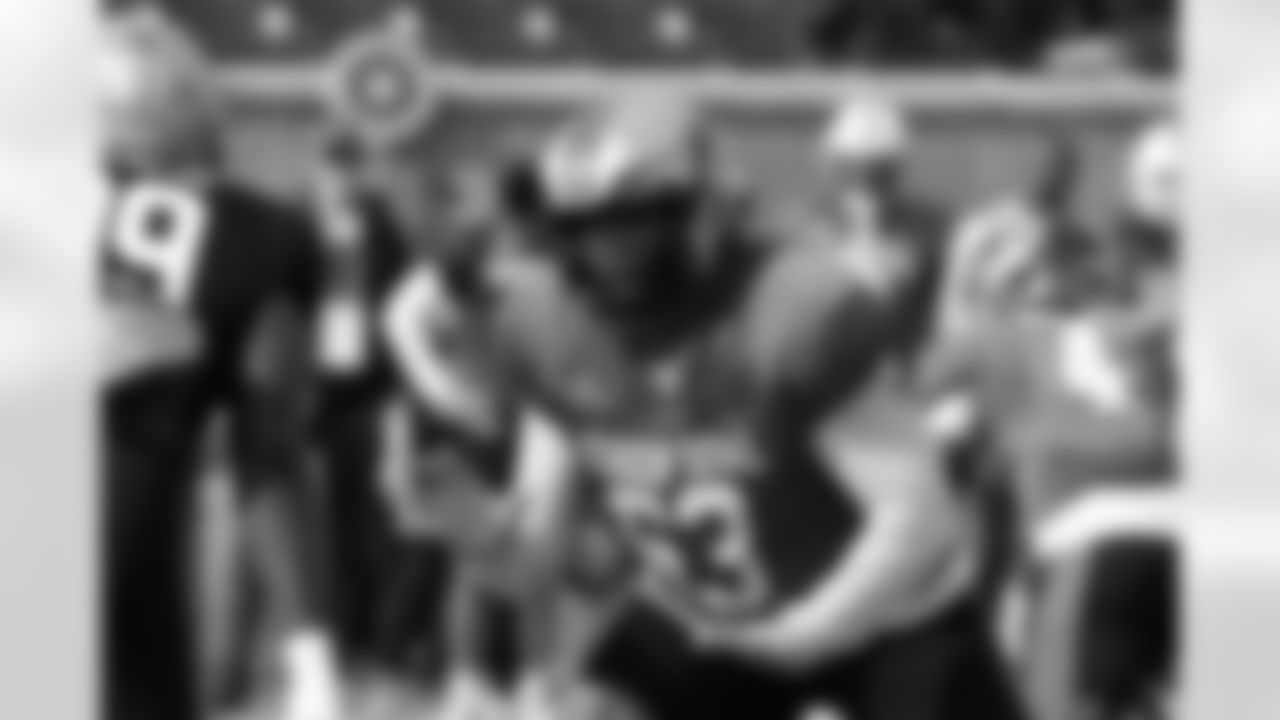 National team offensive lineman Marcus Mbow of Purdue (63) runs through drills during practice for the Senior Bowl NCAA college football game, Wednesday, Jan. 29, 2025, in Mobile, Ala. (AP Photo/Butch Dill)