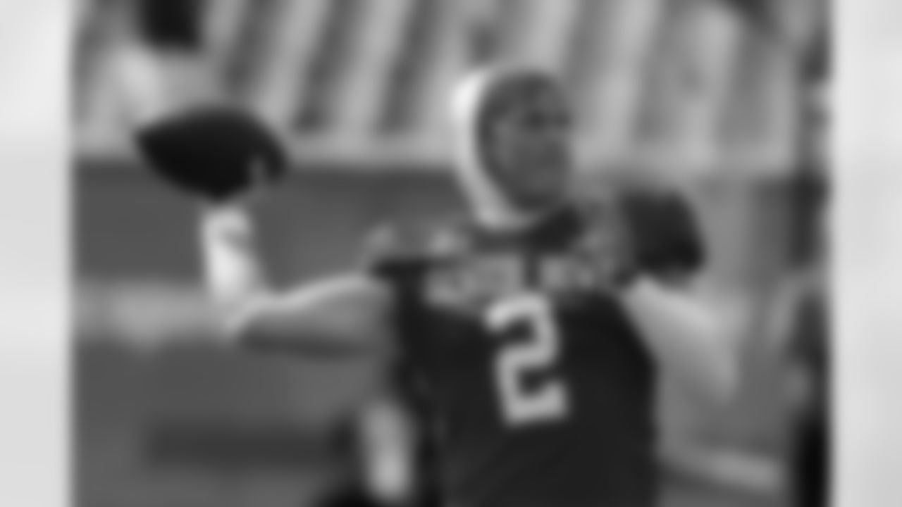 American team quarterback Jaxson Dart of Mississippi (2) runs through drills during practice for the Senior Bowl NCAA college football game, Thursday, Jan. 30, 2025, in Mobile, Ala. (AP Photo/Butch Dill)