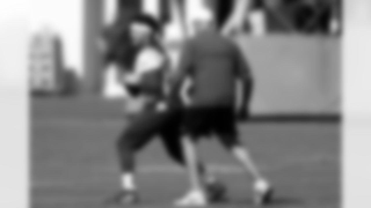 Kansas City Chiefs quarterback Patrick Mahomes (15) runs drills with coach Mike Kafka during practice on Wednesday, Jan. 29, 2020, in Davie, Fla., for the NFL Super Bowl 54 football game. (AP Photo/Brynn Anderson)