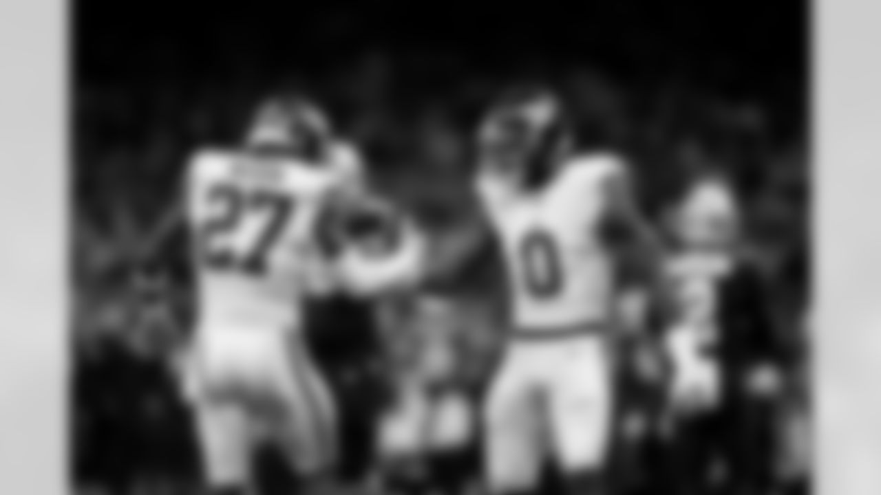 S Tyler Nubin (27) and OLB Brian Burns (0) celebrate during an NFL football game against the New Orleans Saints on Sunday, October 5, 2025 at Caesars Superdome in New Orleans. (BRENNAN ASPLEN/NEW YORK GIANTS)