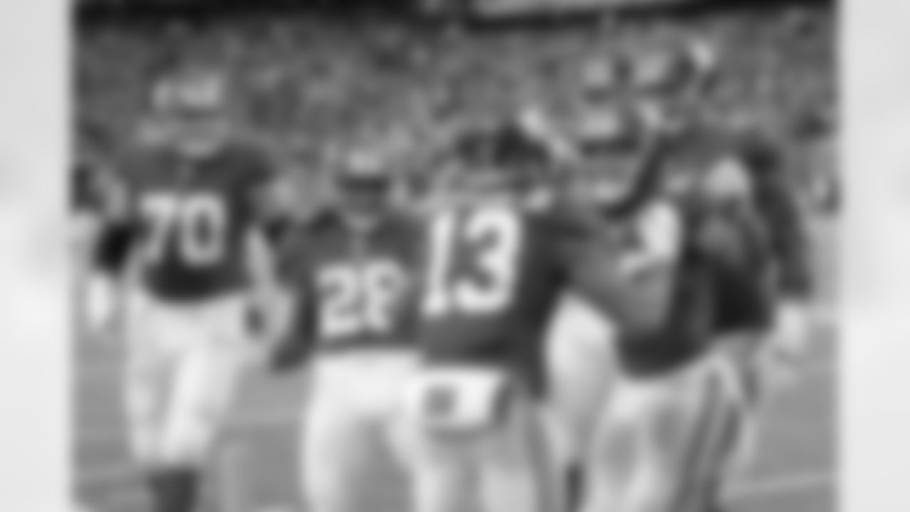 New York Giants wide receiver Odell Beckham (13) celebrates with teammates after scoring a touchdown during the second half of an NFL football game against the Detroit Lions Sunday, Dec. 18, 2016, in East Rutherford, N.J. (AP Photo/Bill Kostroun)