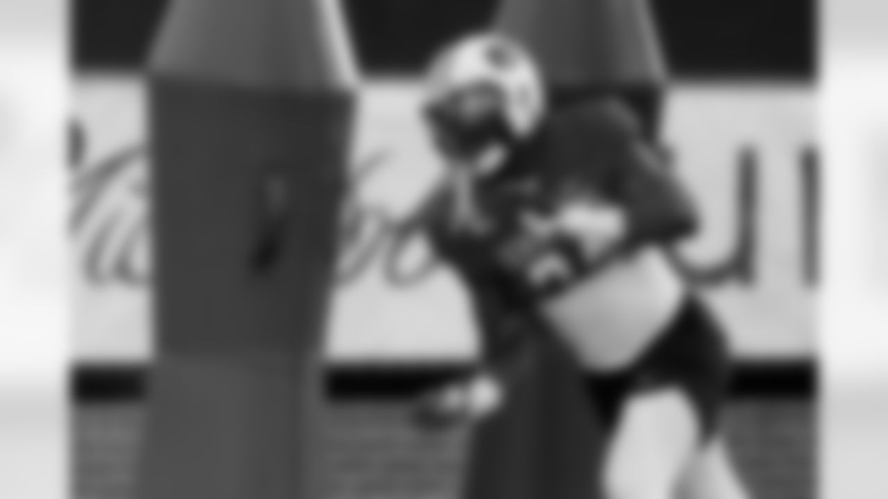 American Team outside linebacker Keyron Crawford (24), of Auburn, runs through drills during practice for the Senior Bowl NCAA college football game Tuesday, Jan. 27, 2026, in Mobile, Ala. (AP Photo/Butch Dill)