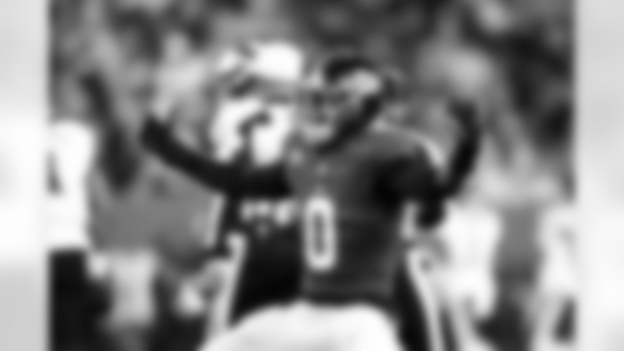 New York Giants outside linebacker Brian Burns (0) celebrates after a sack during an NFL football game against the Philadelphia Eagles, Thursday, Oct. 9, 2025 in East Rutherford, N.J. (Kevin Sabitus via AP)