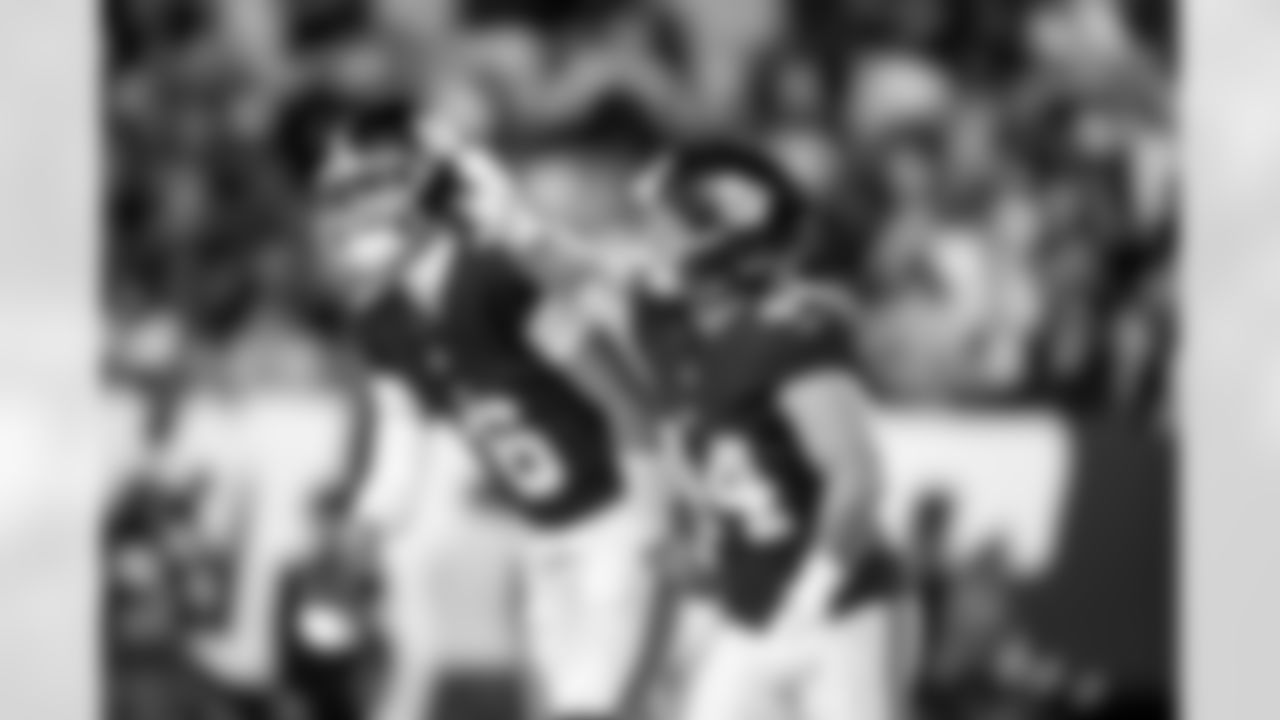 QB Jaxson Dart (6), RB Cam Skattebo (44)