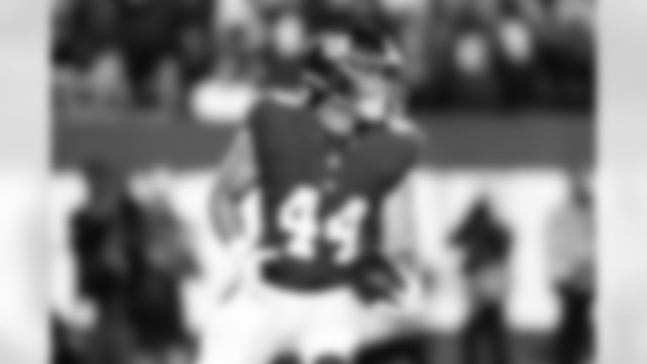 New York Giants running back Cam Skattebo (44) reacts after scoring a touchdown during an NFL football game against the Philadelphia Eagles, Thursday, Oct. 9, 2025 in East Rutherford, N.J. (Kevin Sabitus via AP)