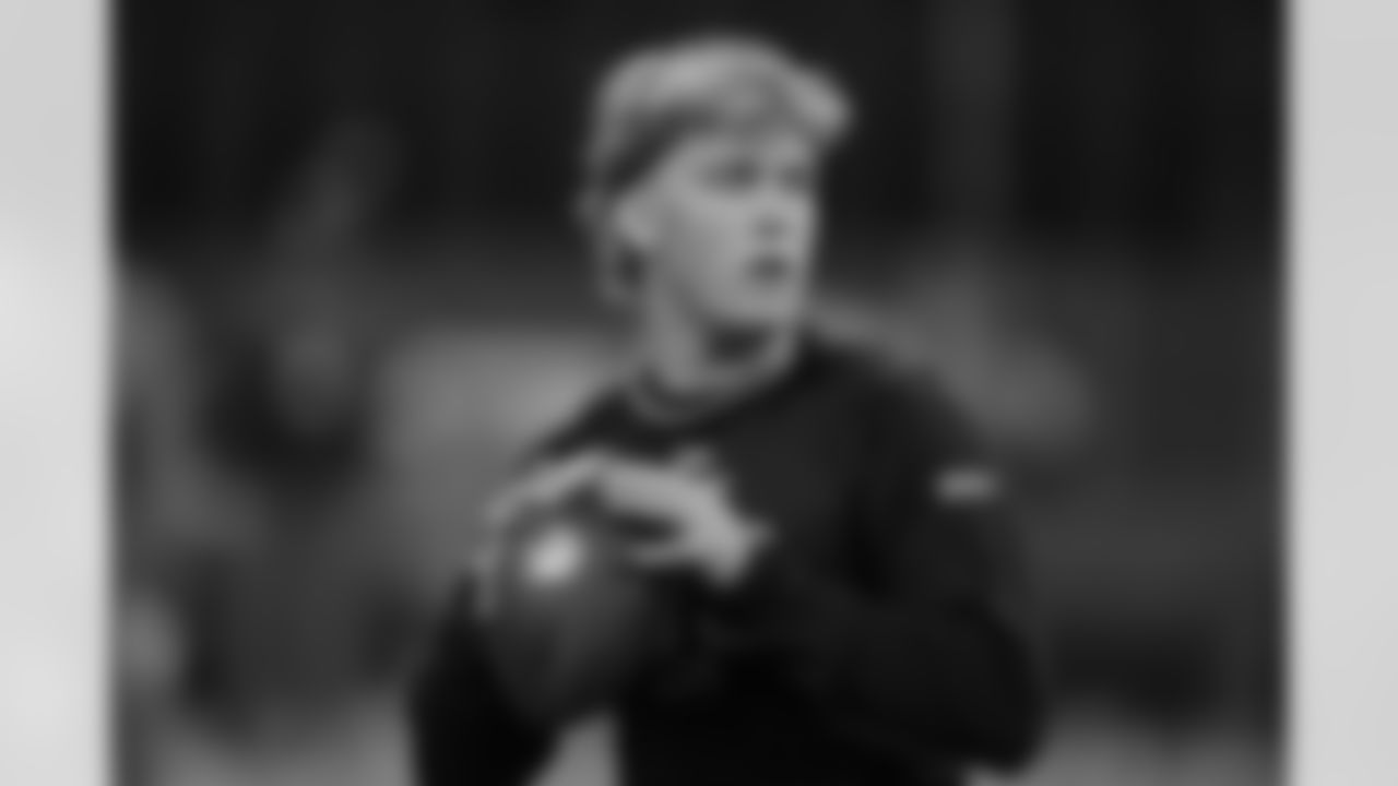 Mississippi quarterback Jaxson Dart warms up at the NFL football scouting combine in Indianapolis, Saturday, March 1, 2025. (AP Photo/Michael Conroy)