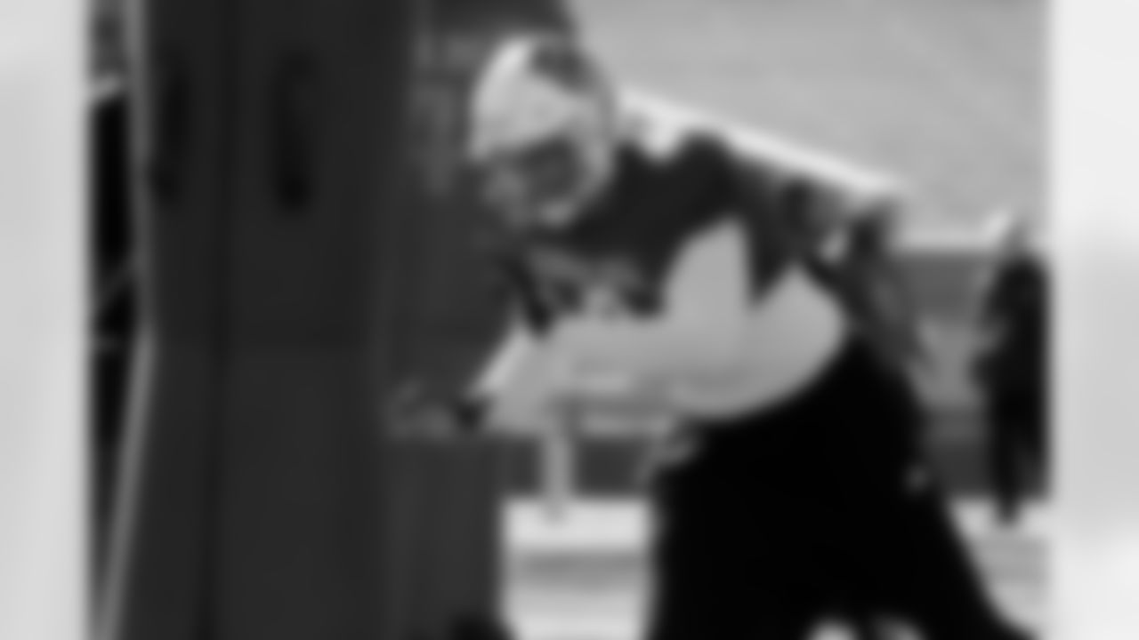 National Team defensive end Cian Slone (8), of North Carolina State, runs through drills during practice for the Senior Bowl NCAA college football game Tuesday, Jan. 27, 2026, in Mobile, Ala. (AP Photo/Butch Dill)