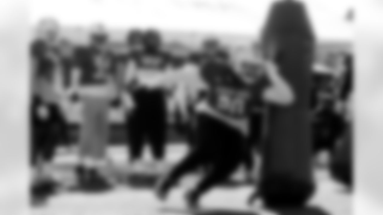 National Team defensive tackle Bryson Eason (20), of Tennessee runs through drills during practice for the Senior Bowl NCAA college football game Tuesday, Jan. 27, 2026, in Mobile, Ala. (AP Photo/Butch Dill)