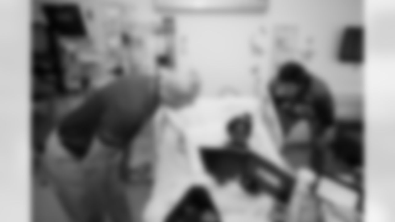 Jacksonville, Fla. – An image from a Wolfson Children's Hospital visit with Jaguars Legend Tom Coughlin and Jaguars long snapper Ross Matiscik on October 1, 2024.