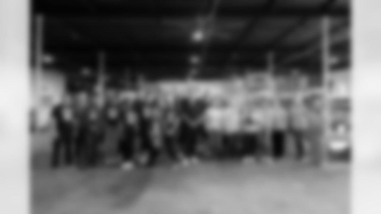 Jacksonville, Fla. — Jaguars staff members volunteer to help sort and pack food for Feeding Northeast Florida on April 29, 2025.
