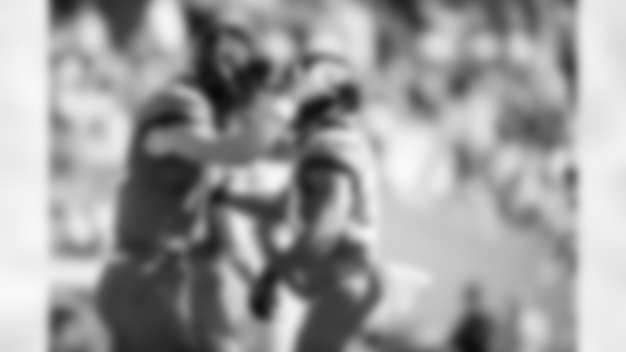 Jacksonville Jaguars vs Los Angeles Chargers
QB Trevor Lawrence (16) and RB Bhayshul Tuten (33)