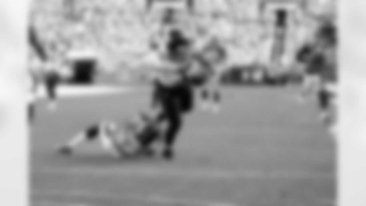 Jacksonville Jaguars tight end James O'Shaughnessy scores a touchdown as Denver Broncos strong safety Will Parks defends during the second half of an NFL football game Sunday, Sept. 29, 2019, in Denver. (AP Photo/Jack Dempsey)