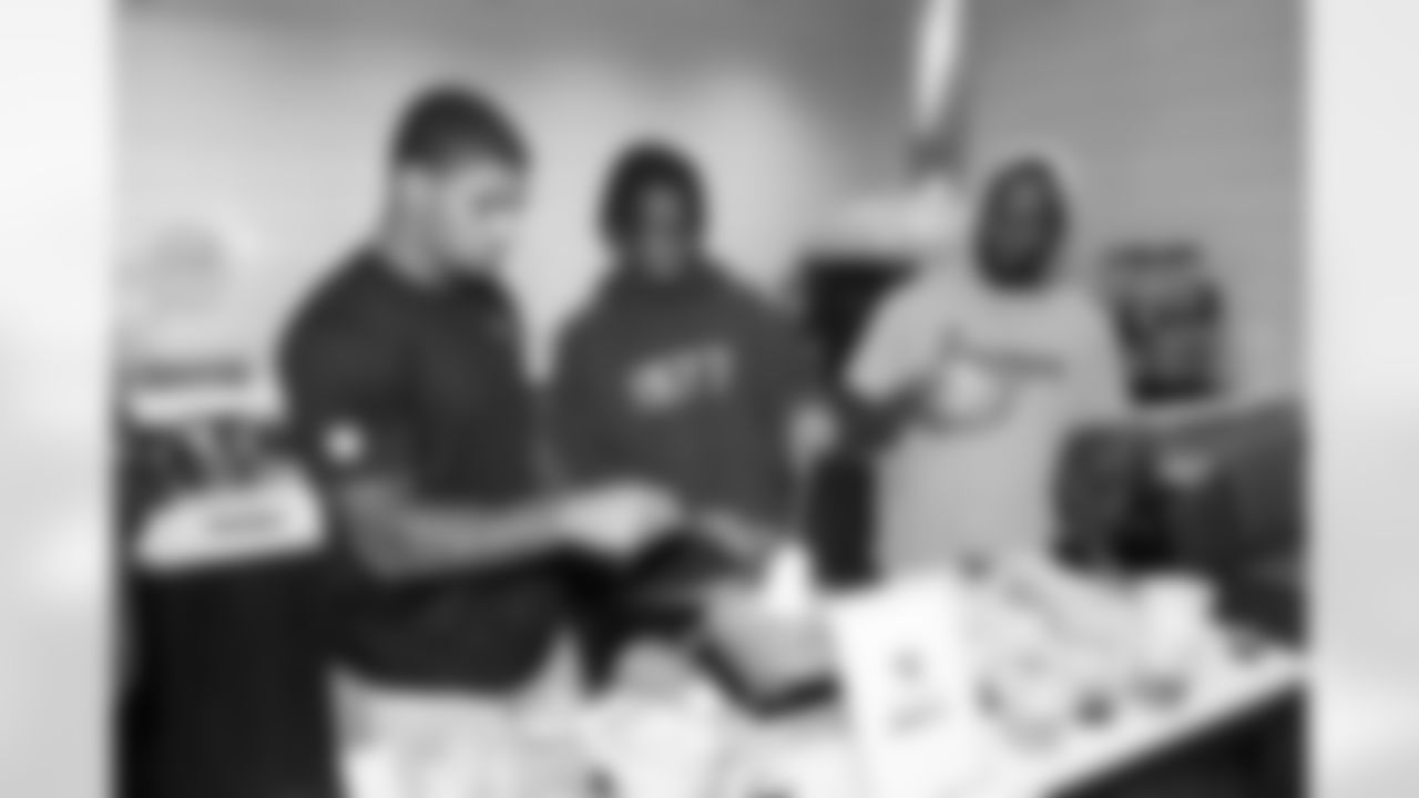 Jacksonville, Fla. — Jaguars wide receiver Eli Pancol, wide receiver Dorian Singer and defensive back Aydan White (left to right) during the rookie cooking competition at the Miller Electric Center on June 3, 2025.