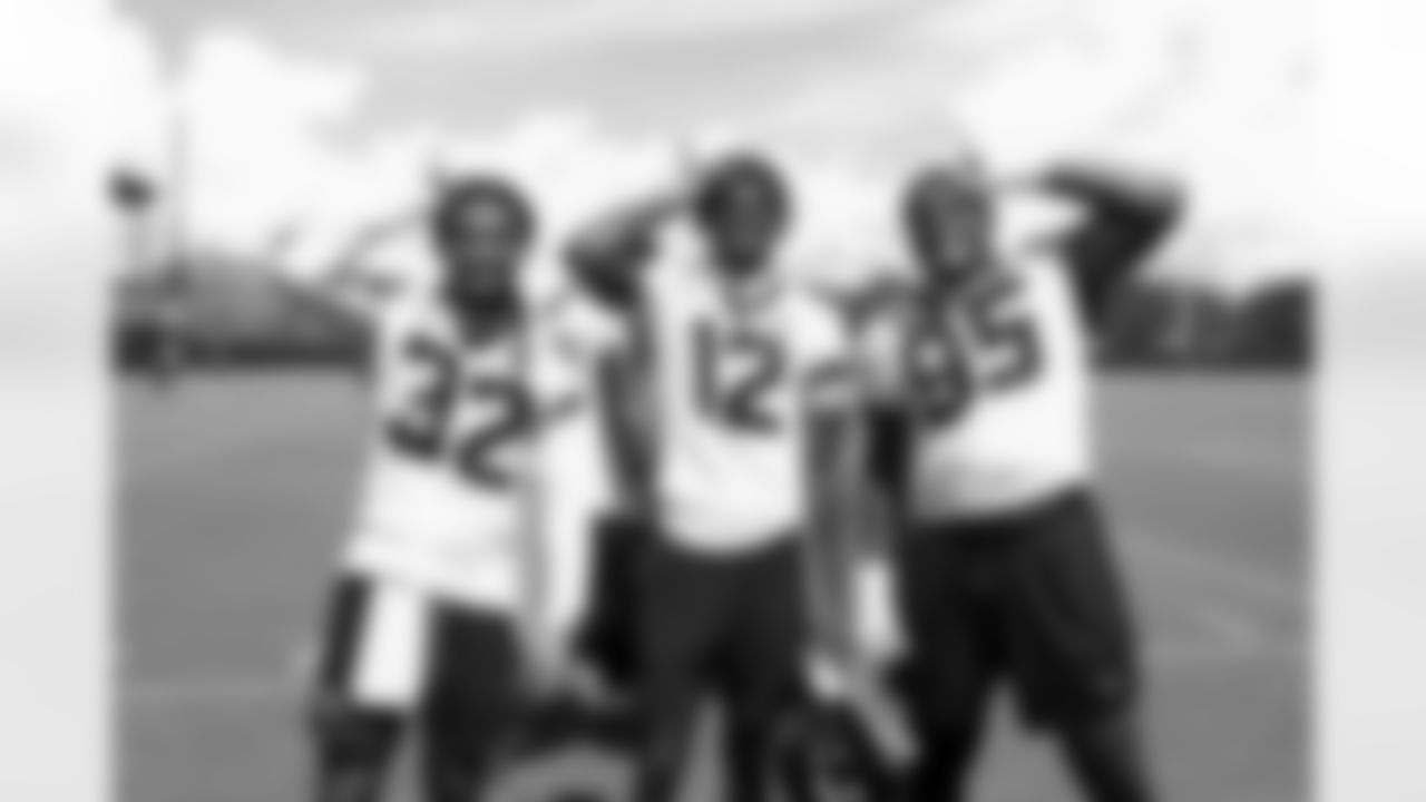 Jacksonville, Fla. — Jaguars safety Cam'Ron Silmon-Craig (32), wide receiver/defensive back Travis Hunter (12) and defensive lineman B.J. Green II (95) after mandatory minicamp at the Miller Electric Center on June 12, 2025.