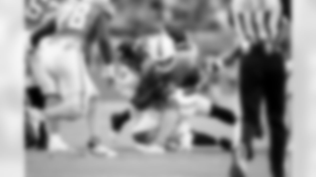 Jacksonville Jaguars vs Miami Dolphins
DL B.J. Green II (95) and DL Danny Striggow (92)