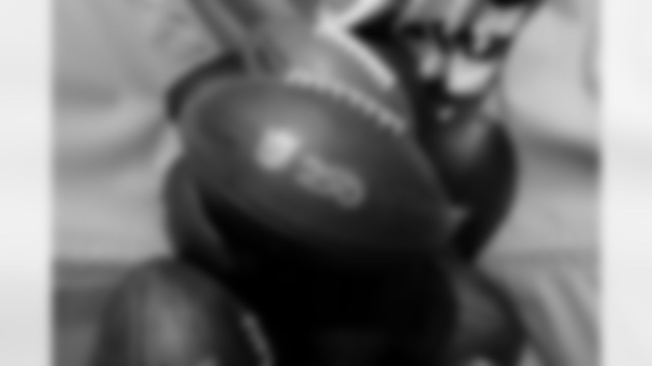 Jacksonville, Fla. — Jaguars football equipment staff prepare America 250 commemorative footballs at the Miller Electric Center on December 29, 2025.