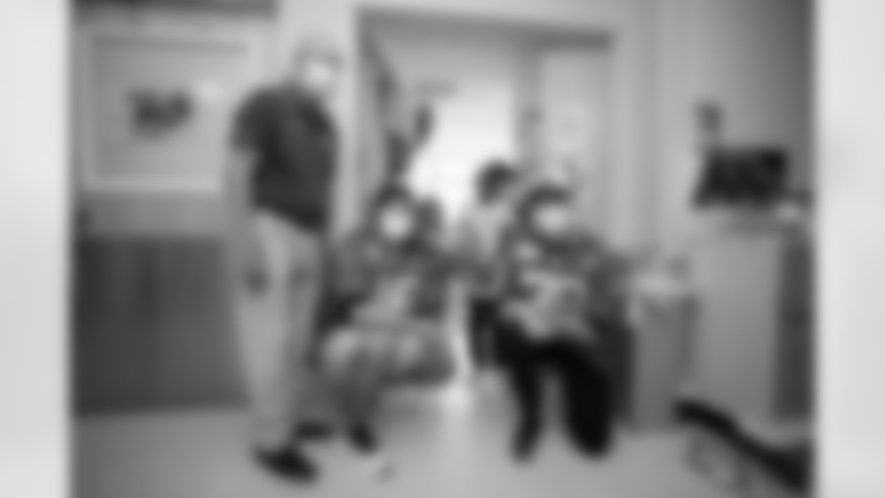 Jacksonville, Fla. – An image from a Wolfson Children's Hospital visit with Jaguars Legend Tom Coughlin, Jaguars kicker Cam Little and Jaguars long snapper Ross Matiscik on October 1, 2024.