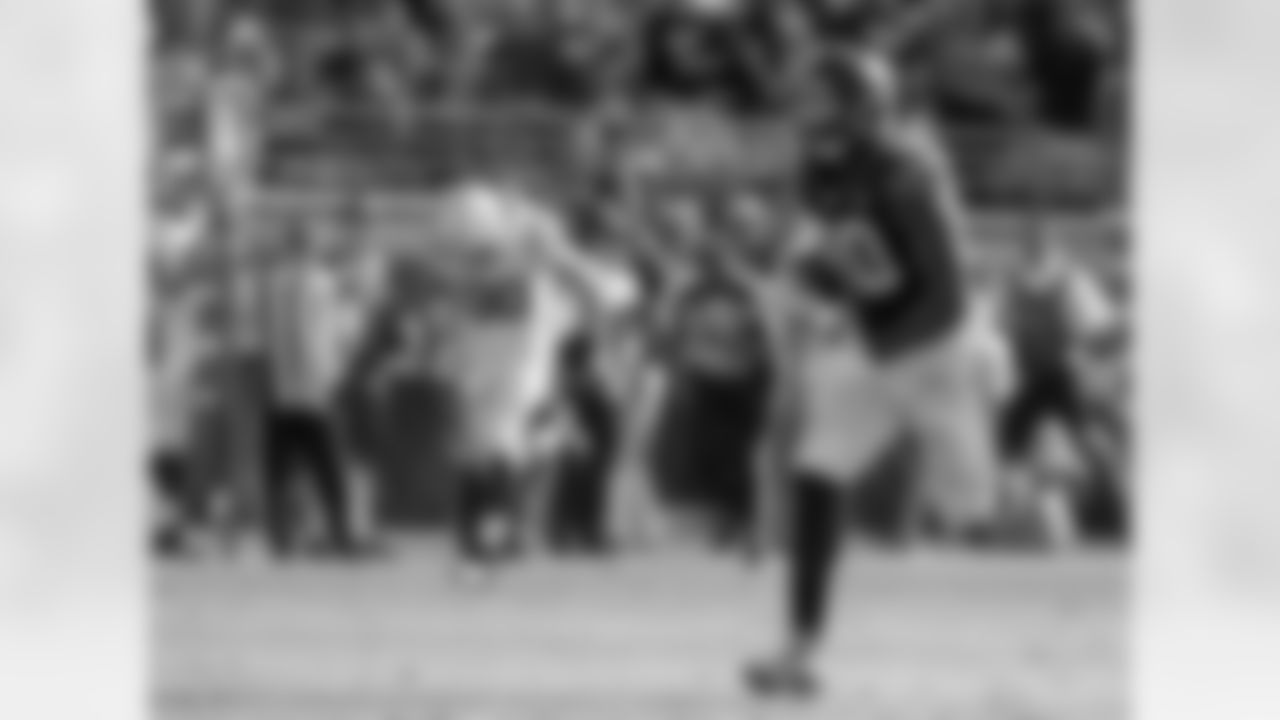 Jacksonville Jaguars defensive end Andre Branch (90) returns a fumble recovery 49-yards for a touchdown as he runs past Indianapolis Colts tight end Coby Fleener (80) during the first half of an NFL football game in Jacksonville, Fla., Sunday, Dec. 13, 2015.(AP Photo/Stephen B. Morton)