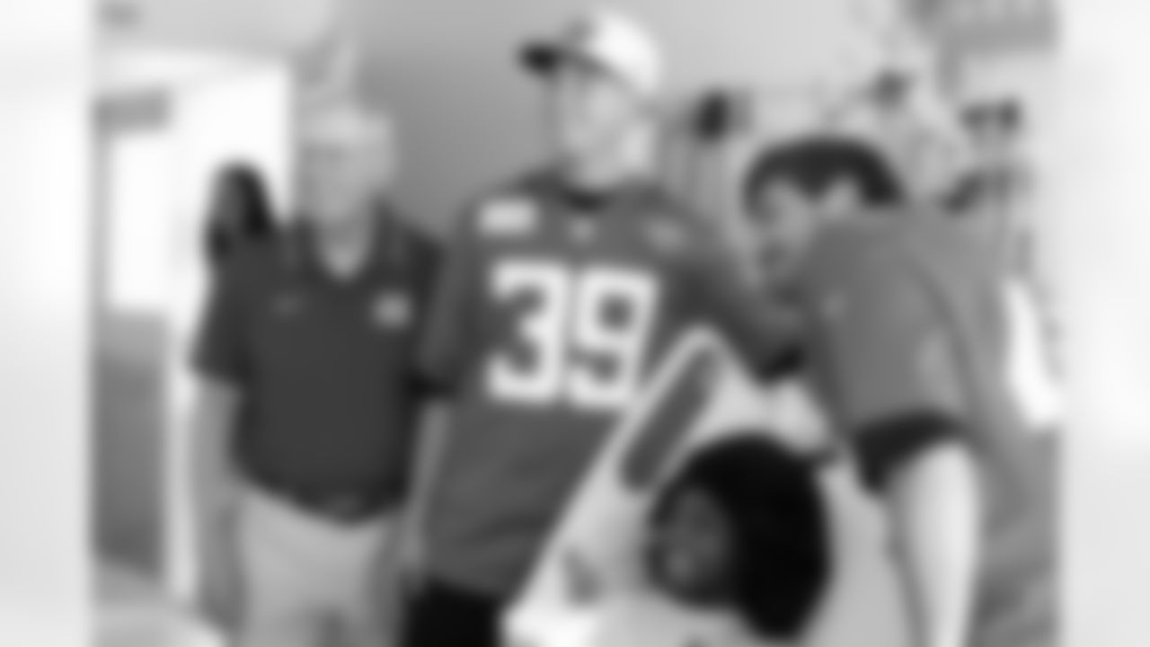 Jacksonville, Fla. – An image from a Wolfson Children's Hospital visit with Jaguars Legend Tom Coughlin, Jaguars kicker Cam Little and Jaguars long snapper Ross Matiscik on October 1, 2024.