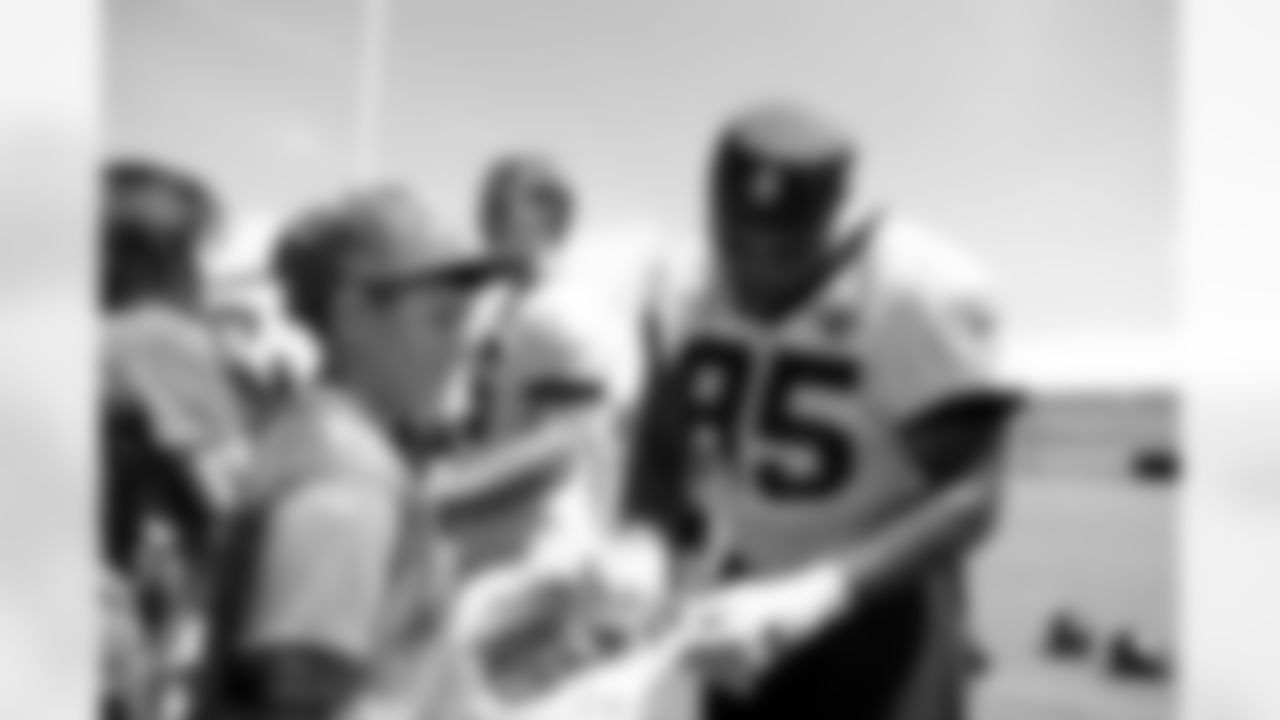 Jacksonville, Fla. — Jaguars defensive lineman B.J. Green II (95) signs autographs for fans during mandatory minicamp at the Miller Electric Center on June 11, 2025.