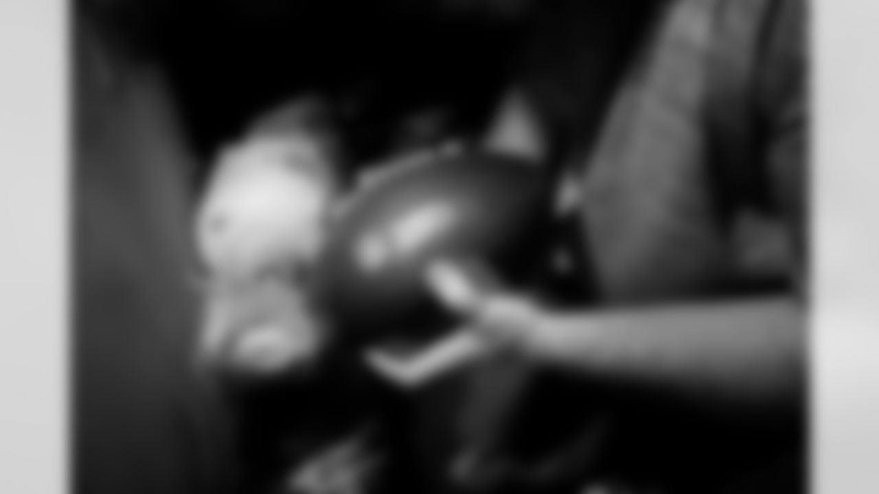 Jacksonville, Fla. — Jaguars football equipment staff prepare America 250 commemorative footballs at the Miller Electric Center on December 29, 2025.