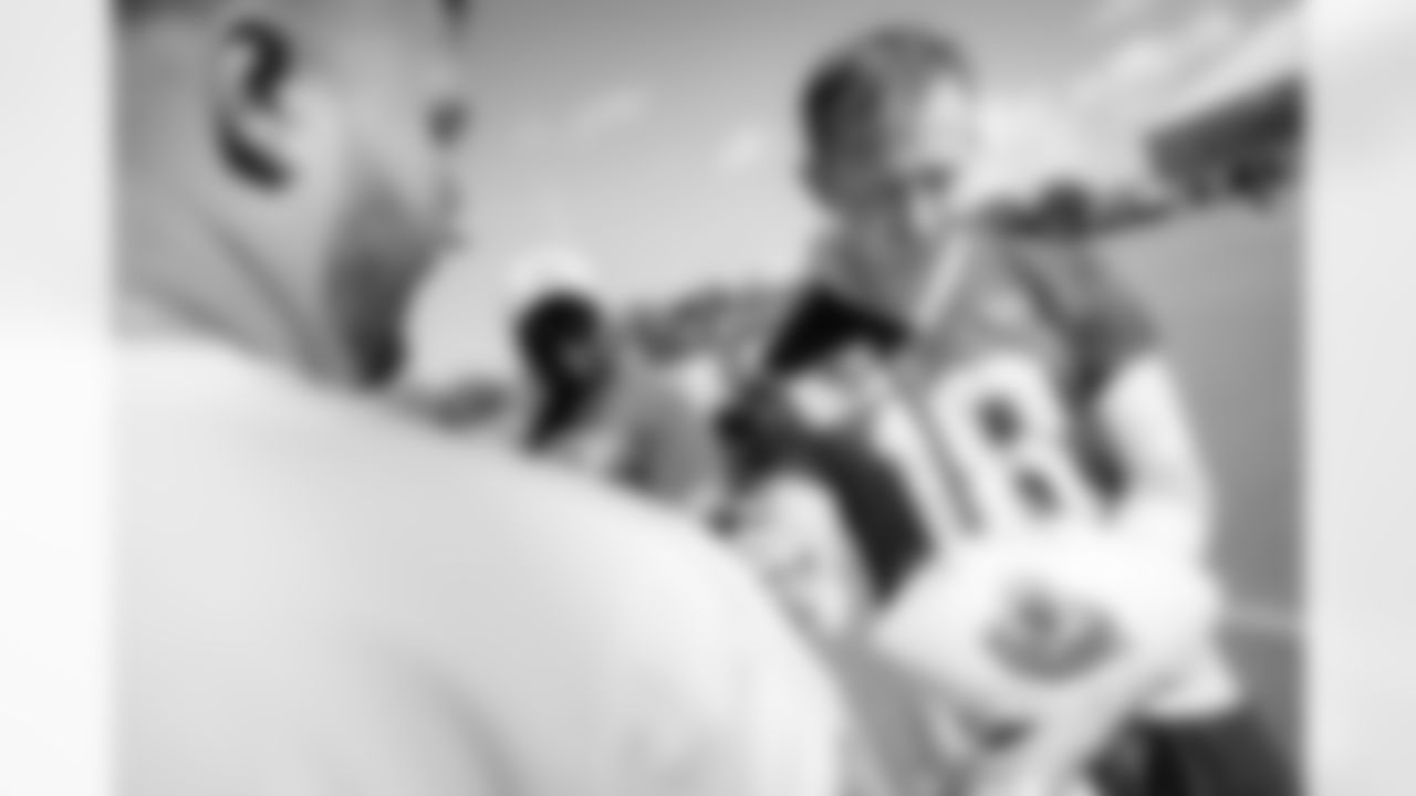 Jacksonville, Fla. — Jaguars quarterback John Wolford (18) signs autographs after training camp at the Miller Electric Center on July 24, 2025.